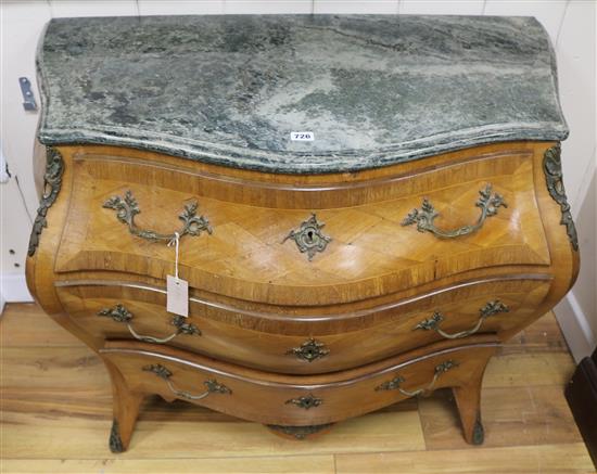 A Louis XV style parquetry inlaid bombe commode, W.110cm